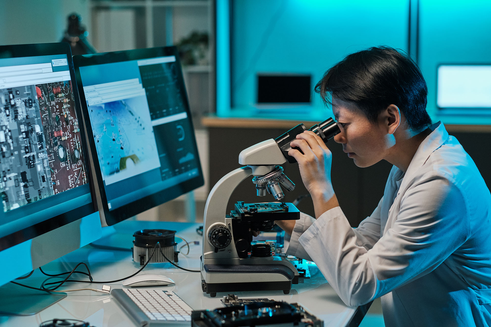female-scientist-looking-in-microscope