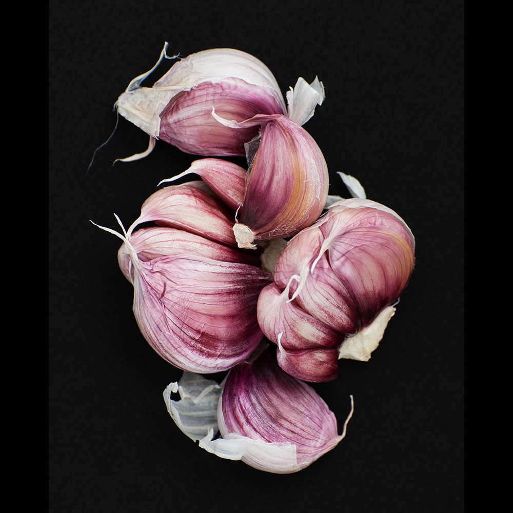 garlic-cloves-on-a-black-background